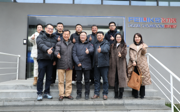 苏州市新时代联合会联席会长谢鸣一行到访飞力达